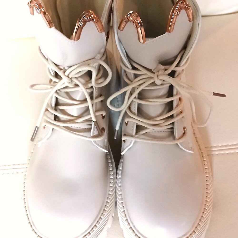 Chic White Ankle Boots with Rose Gold Accents